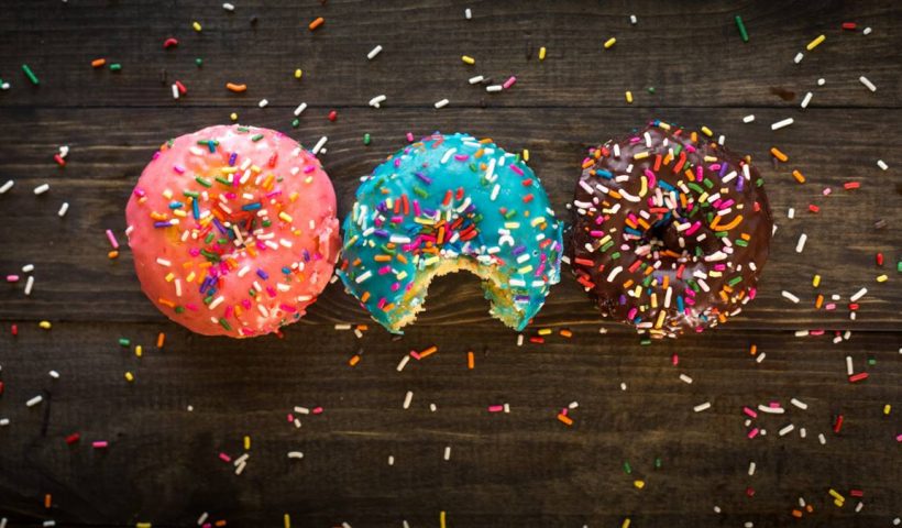 colorful tasty sparkled donuts